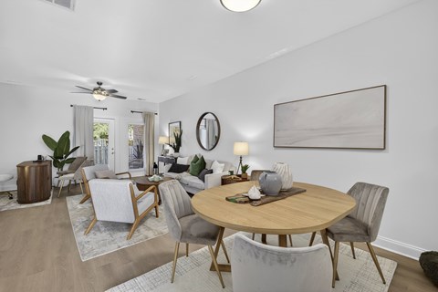 Open-concept living room in 3-bedroom Townes at Prior townhome near Wilmington, NC with neutral tones and inviting layout.
