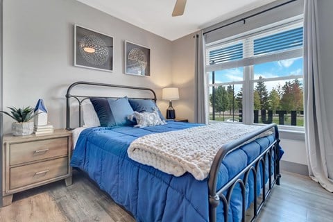 Bedroom With Expansive Windows at Latitude at South Portland Apartment, Maine, 04106