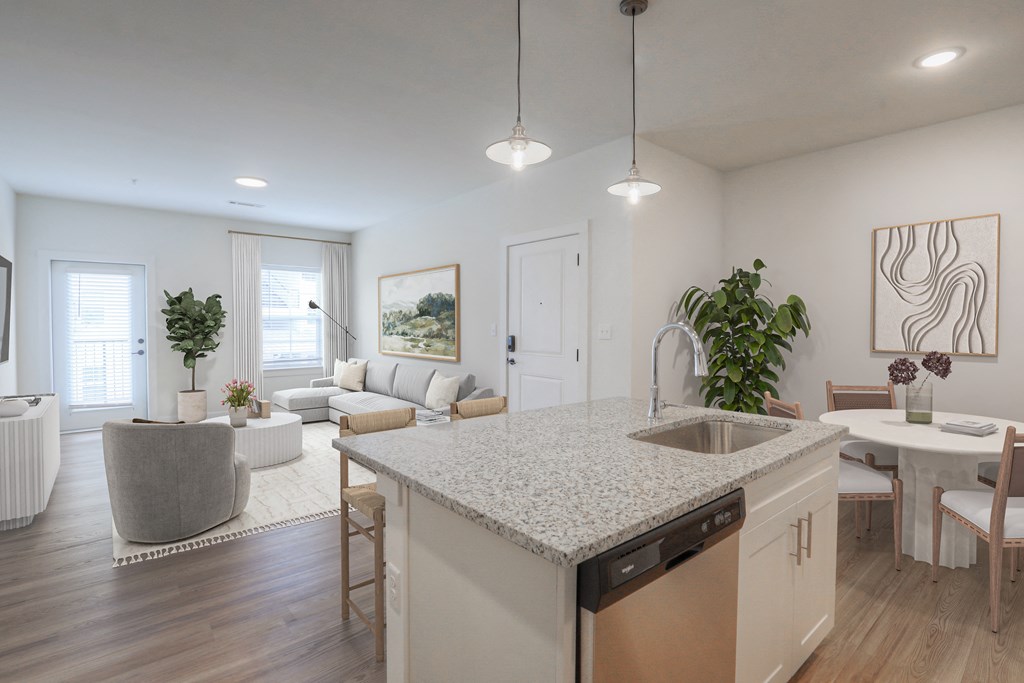 an open floor plan with a kitchen and living room
