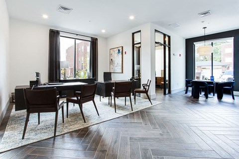 a dining room with a table and chairs at The Indigo Apartments, Canton, GA, 30114