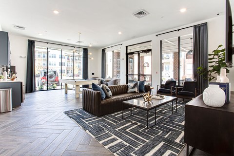 a living room with a couch and a table at The Indigo Apartments, Canton, 30114