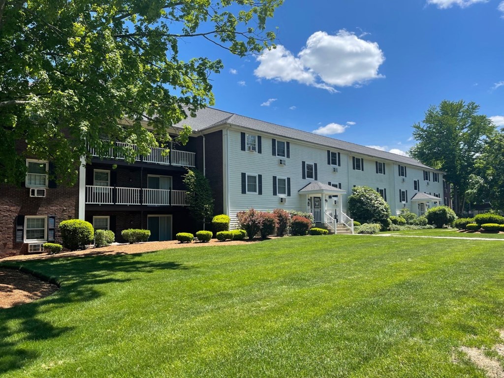 Exterior with greenery at Coach House, Massachusetts, 01824