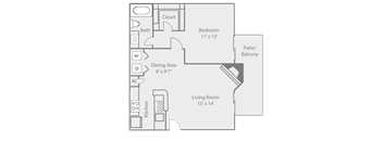 A floor plan of a small apartment with a living room, dining area, kitchen, and bedroom.