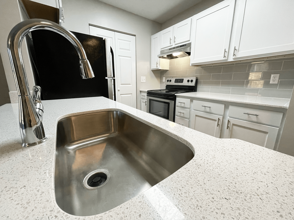Amberwood at Lochmere, Cary NC, renovated kitchen with goose neck sink faucet