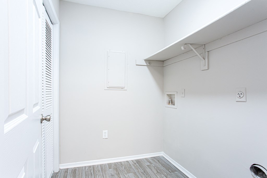 A spacious walk-in closet with shelving Ascend at Stone Mountain apartments. Stone Mountain, GA 30088.