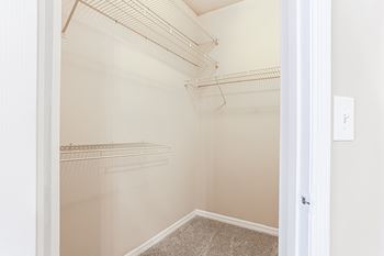 a walk in closet  at Avenues of Kennesaw East & West, Georgia