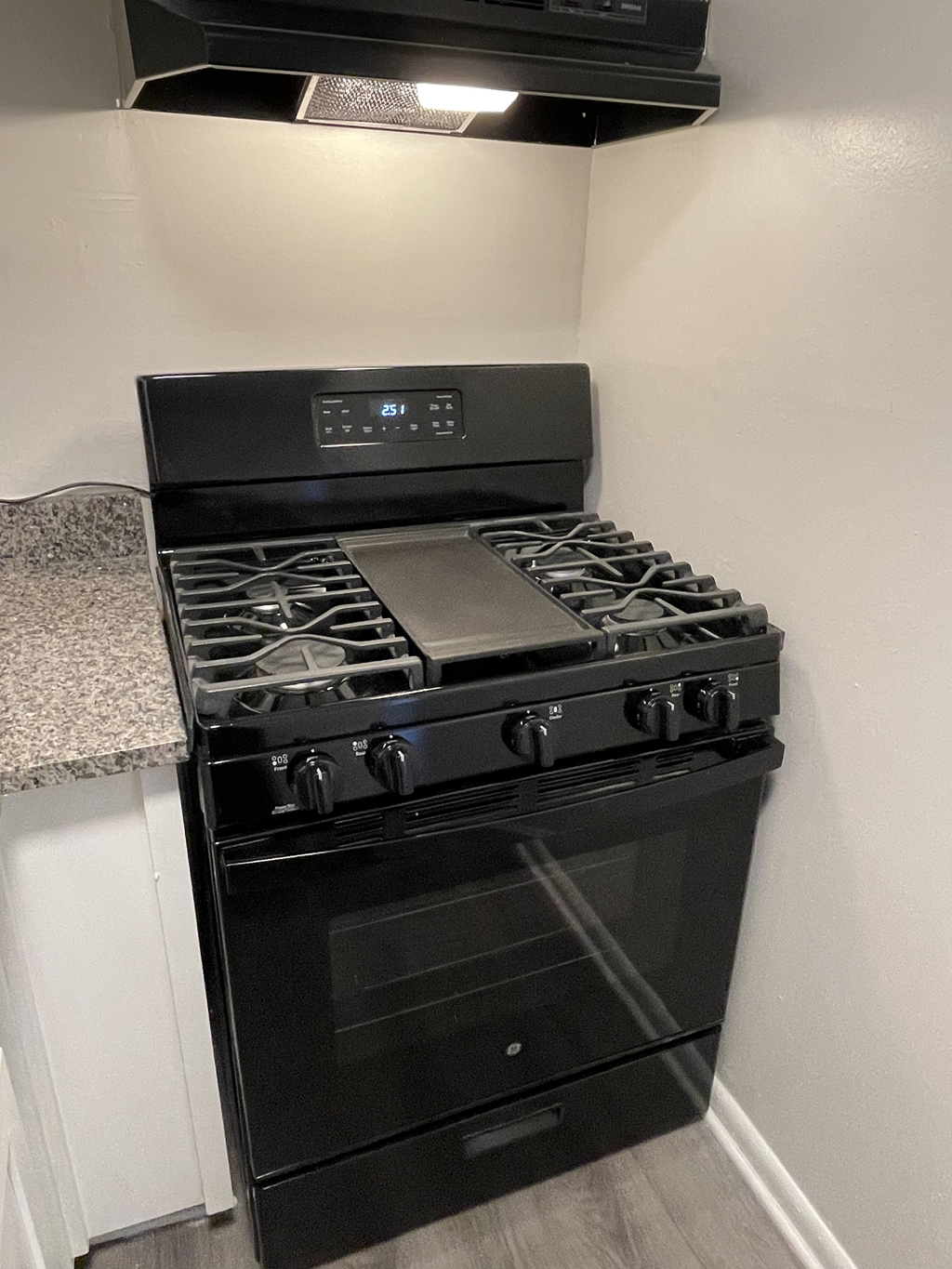 Black stovetop at Barracks West apartments in Charlottesville, VA