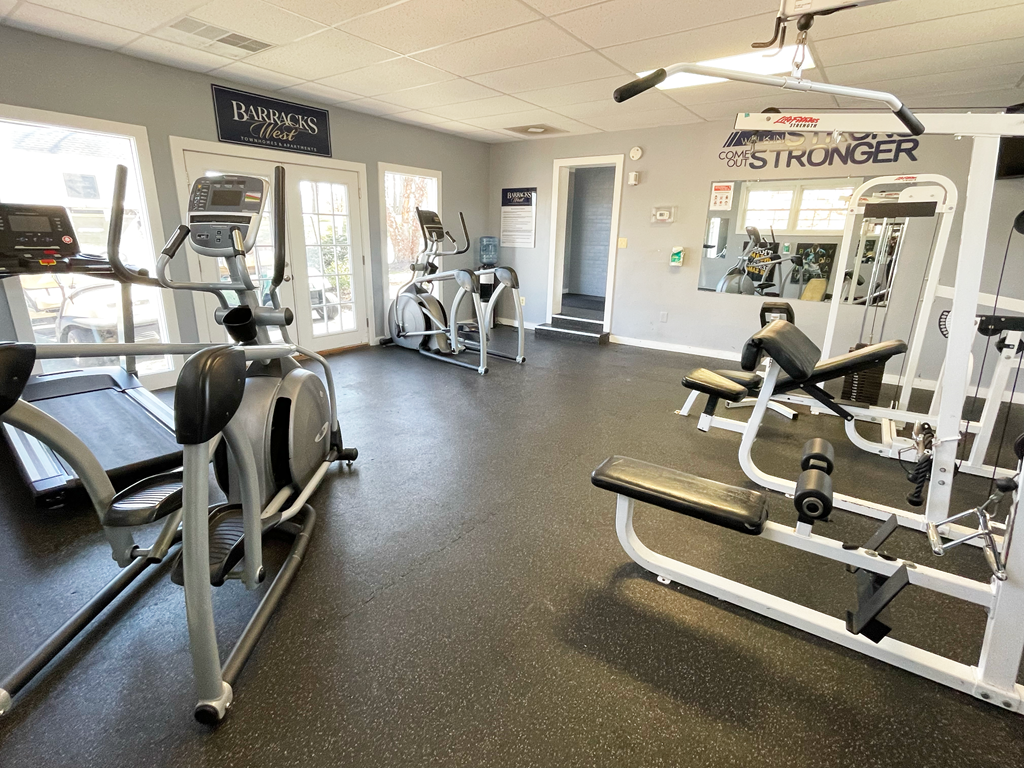 Fotness center with machines at Barracks West apartments in Charlottesville, VA