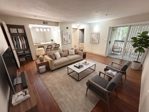 A living room with a couch, chairs, and a television.