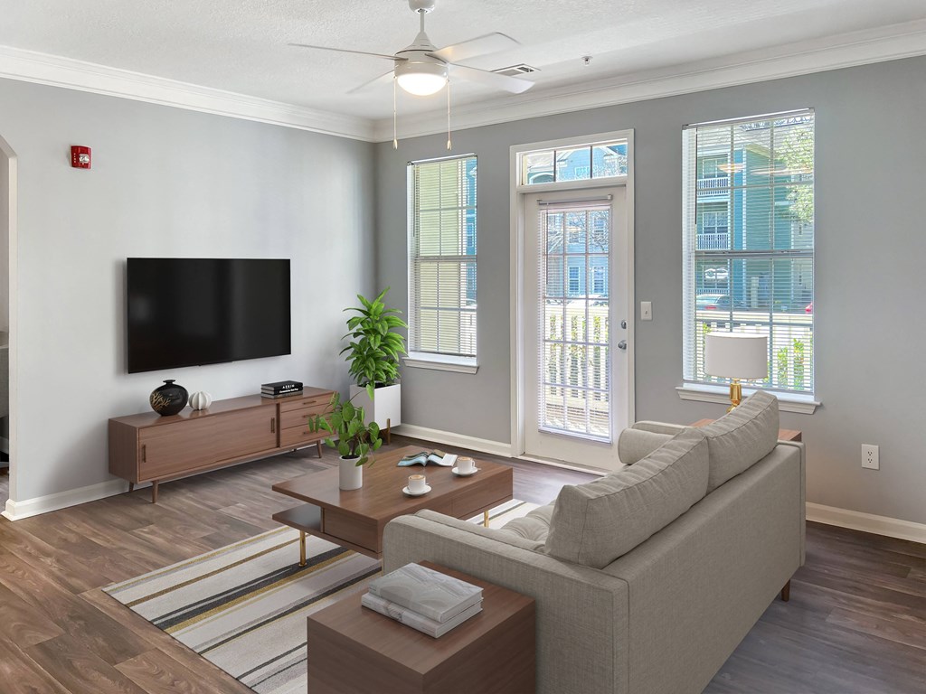 a living room with a couch and a tv