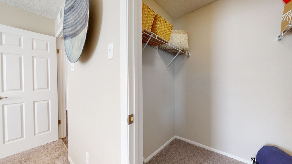 a bedroom with a closet and a white door at Breckinridge Vue, Duluth, GA, 30096