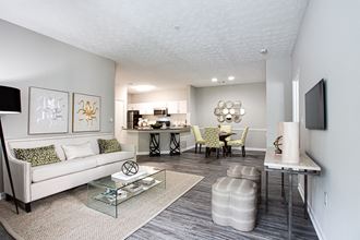 Brodick Hills 2 bedroom model living room with couch - Photo Gallery