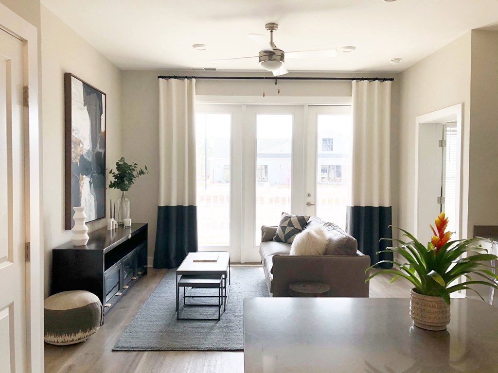 a living room with a couch and a table