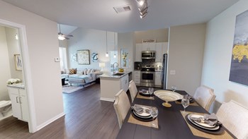 Dining Room and Kitchen View Dining Room and Kitchen View at Century Deerwood Park, Florida - Photo Gallery 2