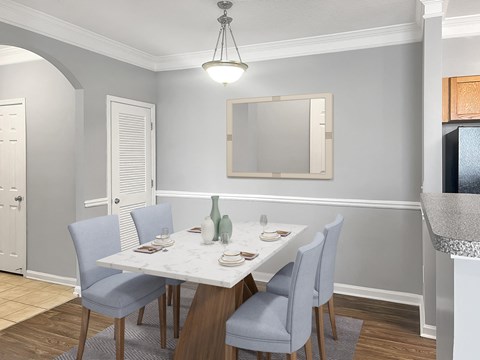 an image of a dining room with a table and chairs