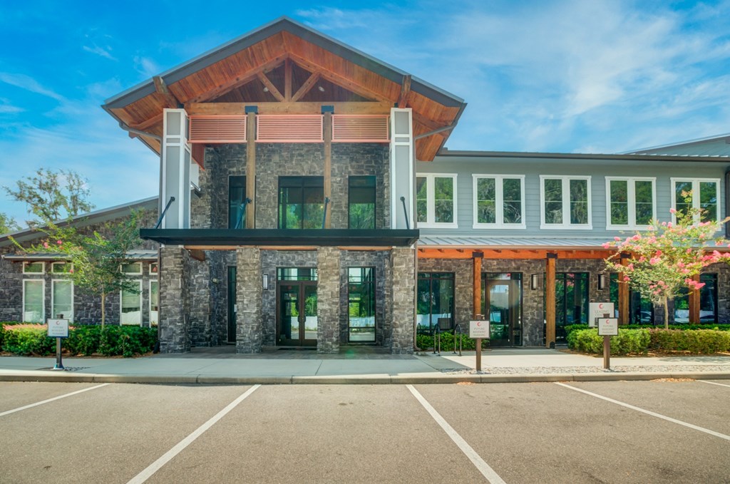 the front of a building with a parking lot at Century Town Center, Gainesville, Florida