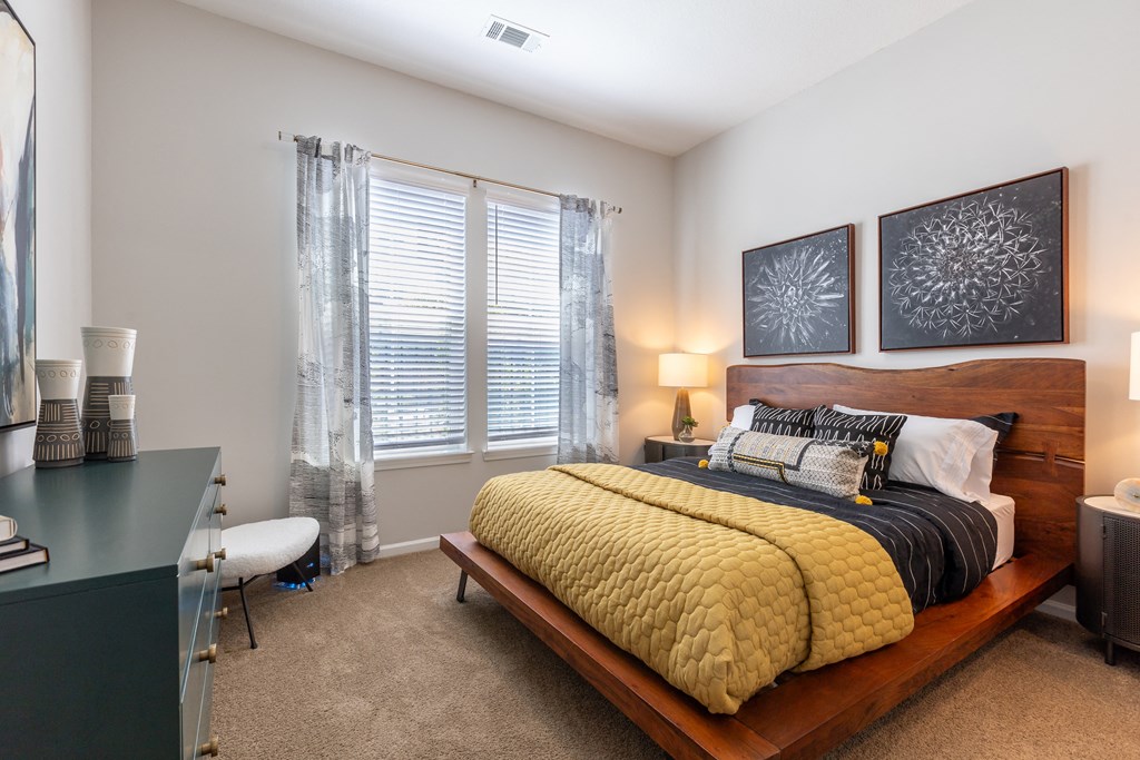 our apartments offer a bedroom with a king sized bed at Century University City, Charlotte, NC