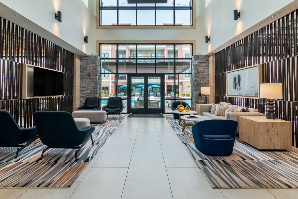 the lobby at the bradley braddock road station apartments  at Century West Pryor, Lee's Summit, Missouri
