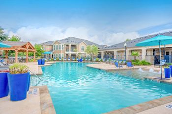 The Deck | Resort-Style Swimming Pool with Tanning Ledge & Outdoor Kitchen