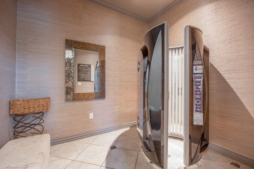 a lobby with a vending machine and a mirror