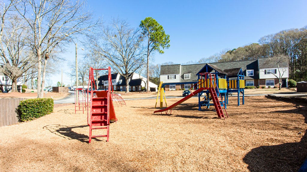 Playground with slides  at Chelsea Place apartments Lithonia, GA