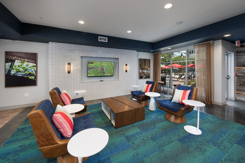 a resident clubhouse with a tv and seating area at Marley EAV, Atlanta, GA, 30316