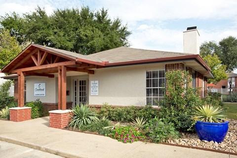 A small building with a sign that says "Crestview".