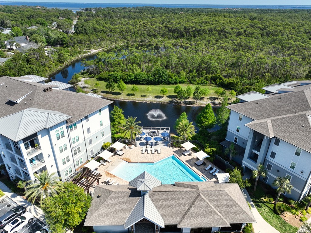 a aerial view of the resort with a swimming pool
