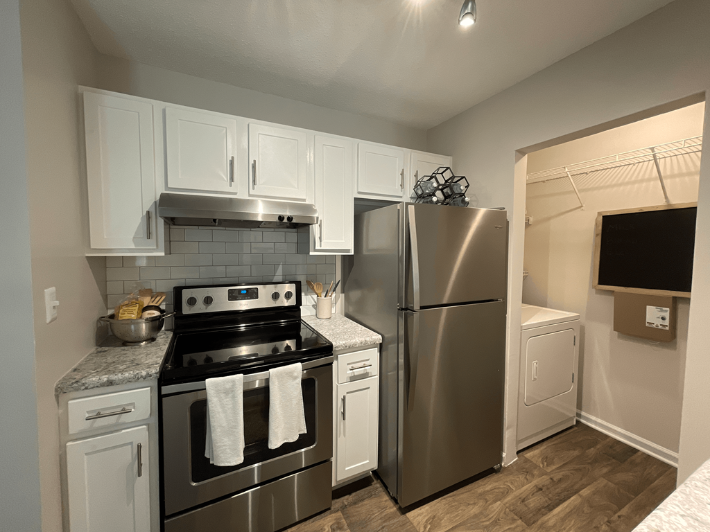 modern kitchen featuring stainless steel appliances at Palmetto Place, Fort Mill