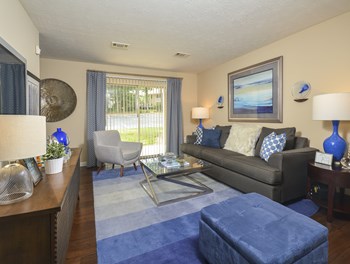 Living and kitchen at Harvard Place Apartment Homes by ICER, Lithonia, 30058 - Photo Gallery 55