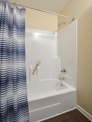 Bath tub in bathroomat Harvard Place Apartment Homes by ICER, Lithonia - Photo Gallery 64