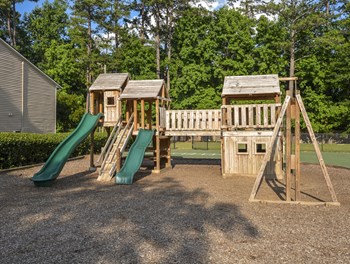 Kids play at Harvard Place Apartment Homes by ICER, Lithonia, Georgia - Photo Gallery 84