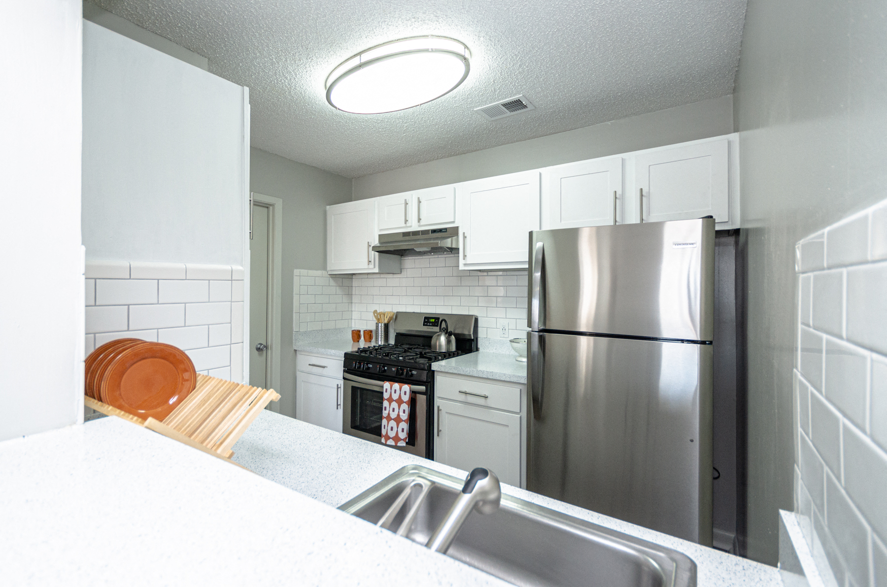 Sink With Faucet at The Carter 4250 Apartments, Georgia 30093