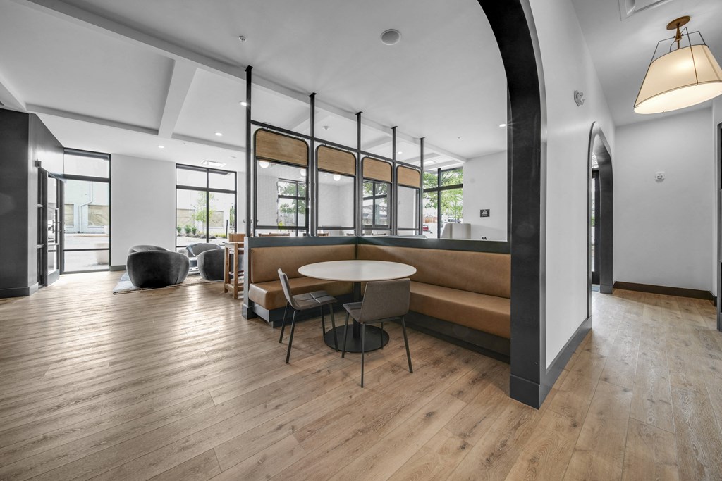 a living room with a couch and a table
