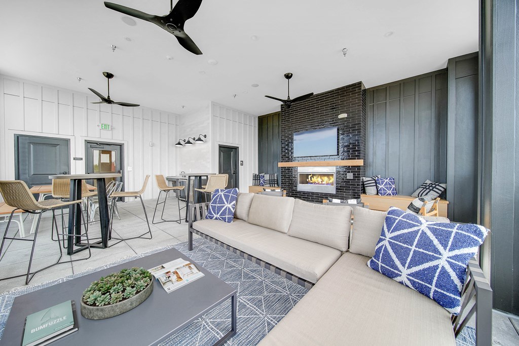 a living room with a couch and a table