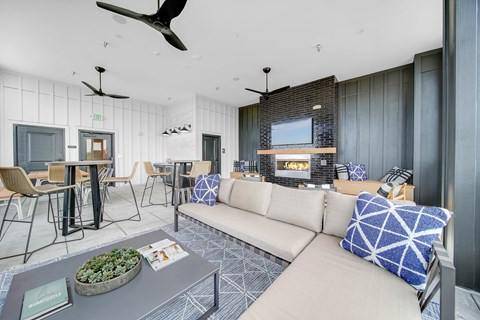 a living room with a couch and a table