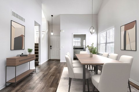 A modern dining room with a wooden table and white chairs.