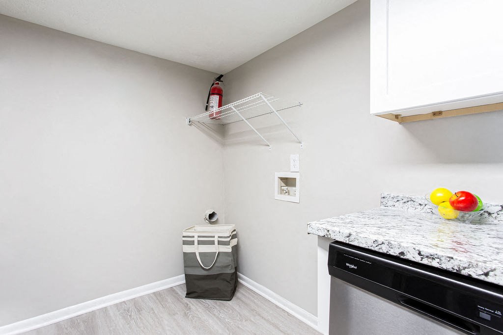 Laundry room with a washer and dryer at The Cobb Apartments-Townhomes, Austell, GA