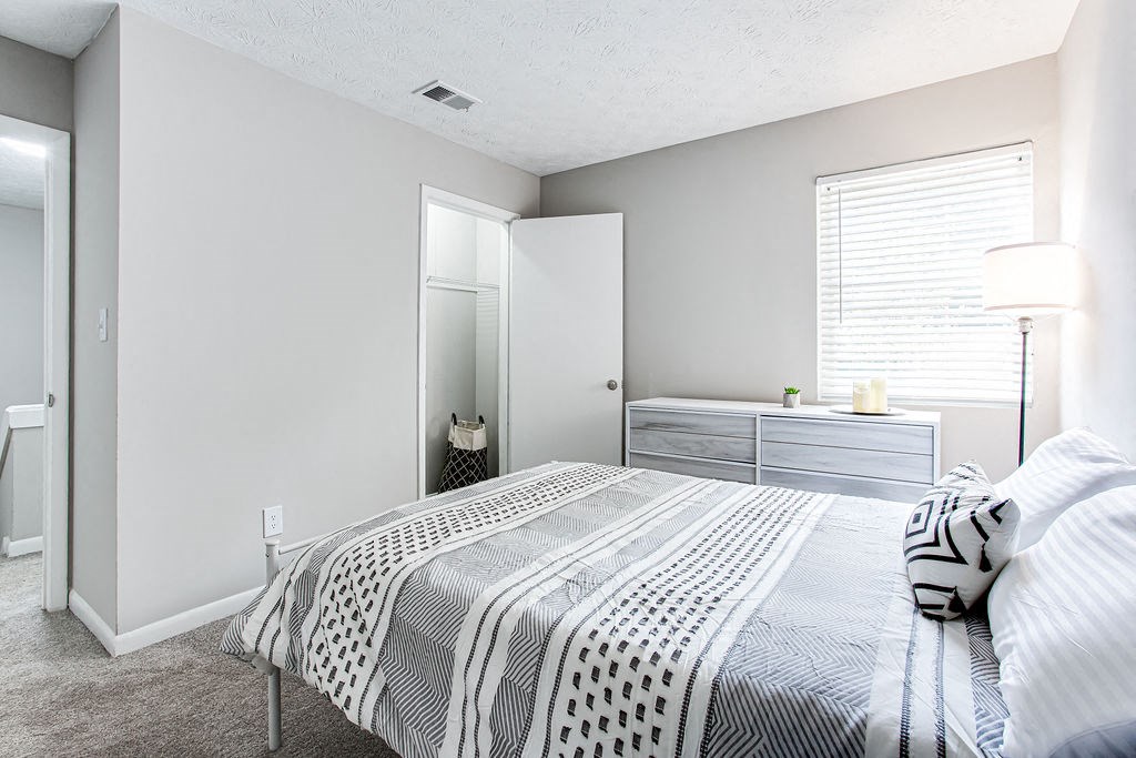 Bedroom With Plenty Of Natural Lights at The Cobb Apartments-Townhomes, Austell