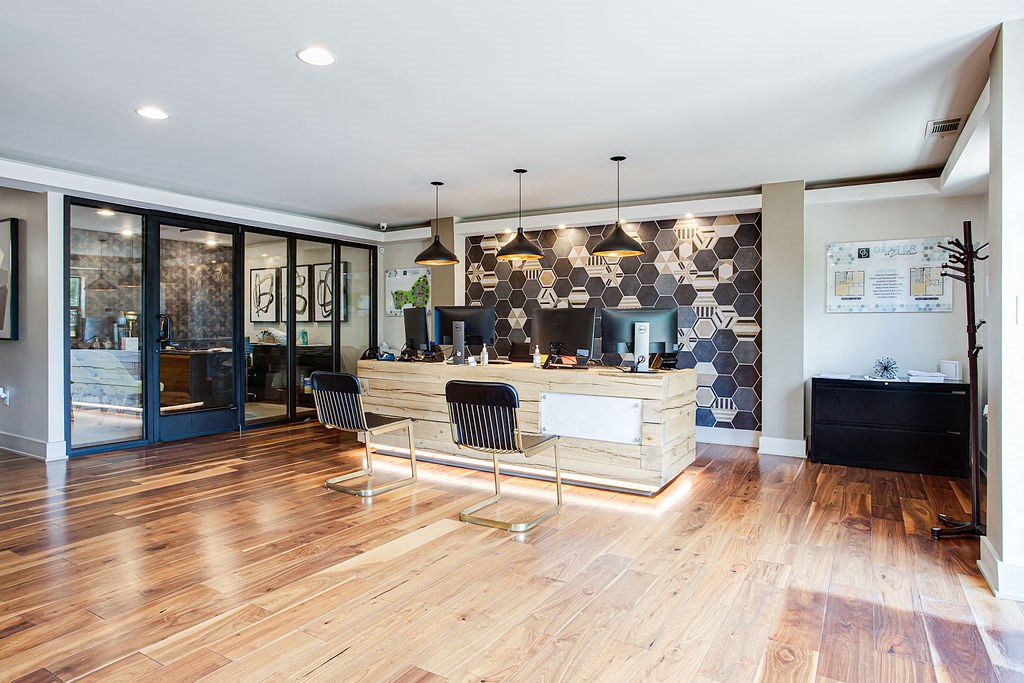 the lobby or reception area of a home with a wood floor
