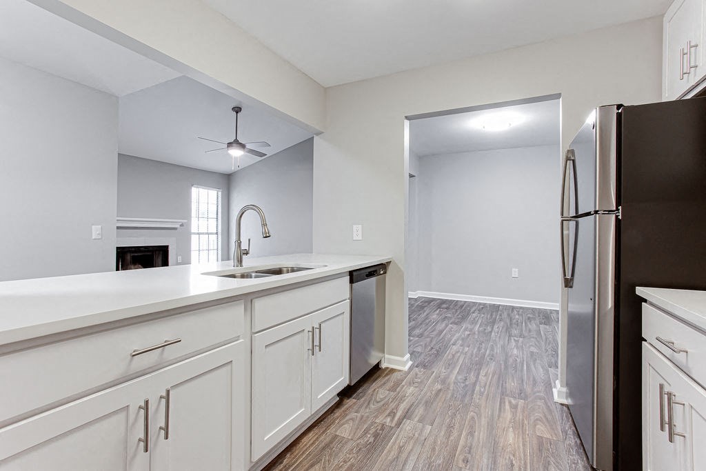 a kitchen with white cabinets at Magnolia Place at Stockbridge Apartments, Georgia, 30281