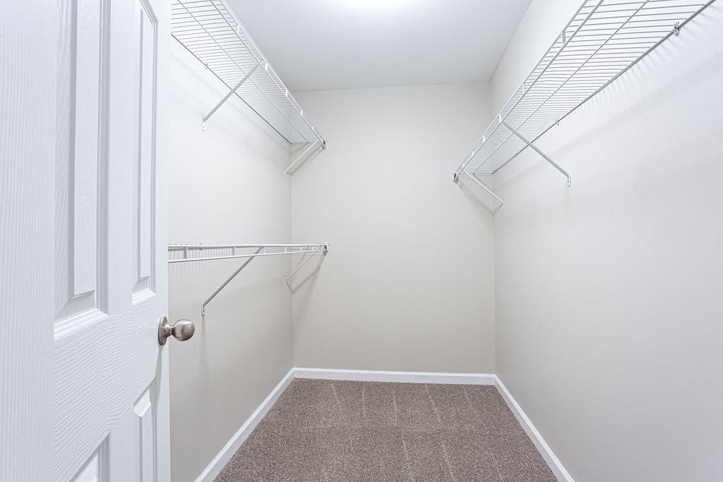 closet with wire shelf at Magnolia Place at Stockbridge Apartments, Stockbridge, GA, 30281