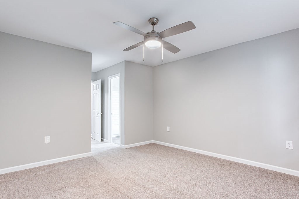bedroom room with a ceiling fan at Magnolia Place at Stockbridge Apartments, Stockbridge, 30281
