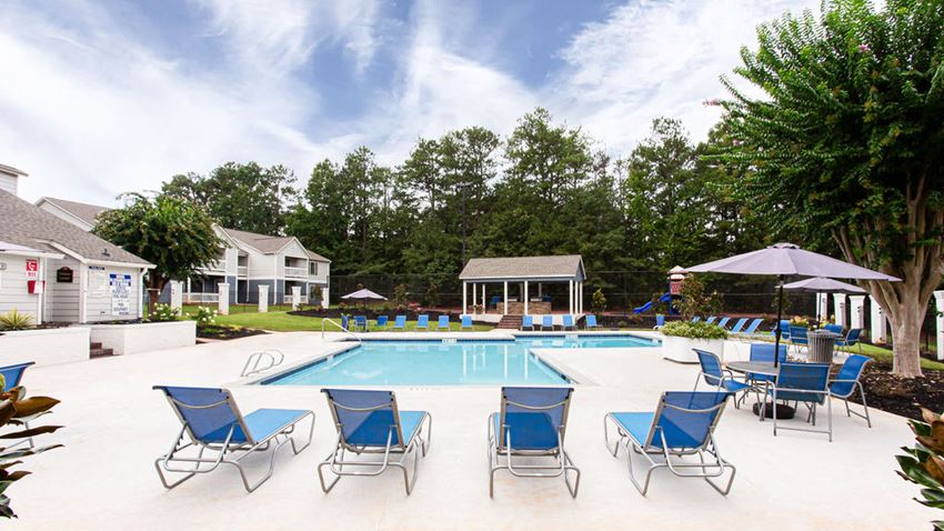 our apartments have a large pool and lounge chairs - Photo Gallery