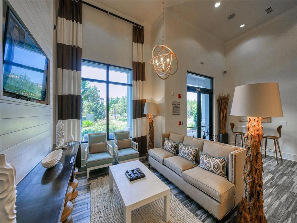 a living room with a couch and a table