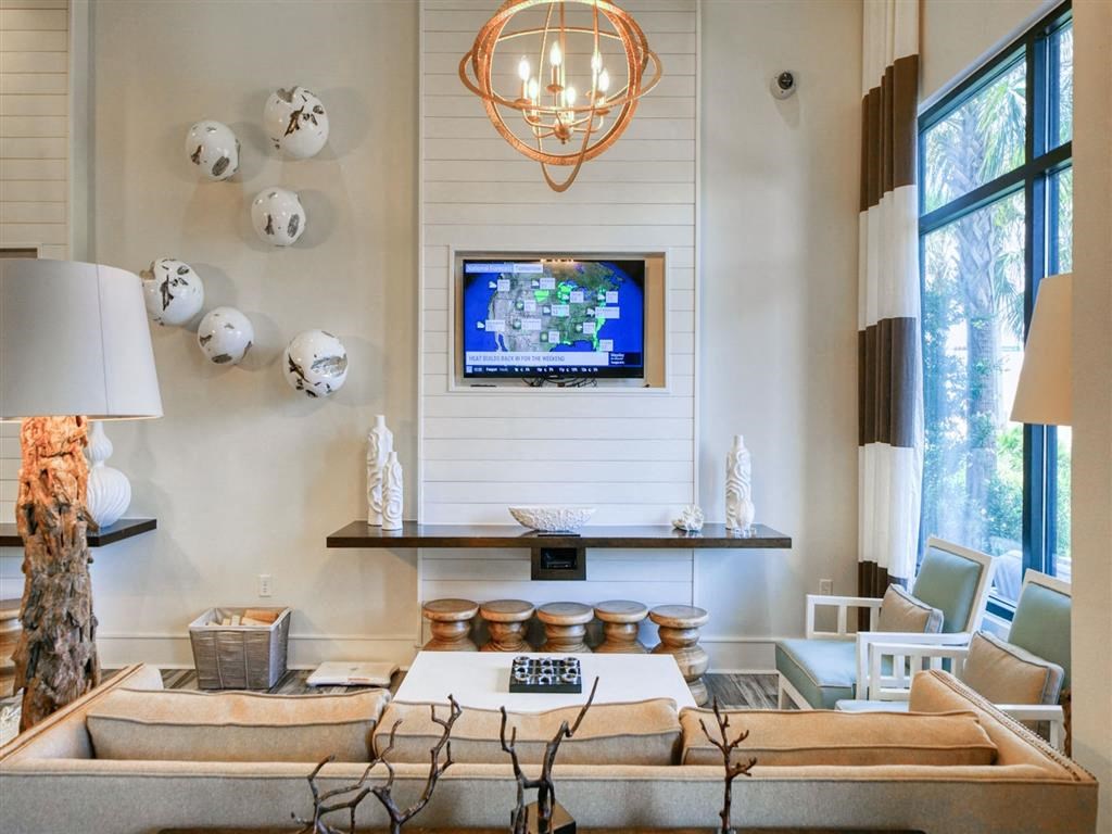 a living room with a couch and a television