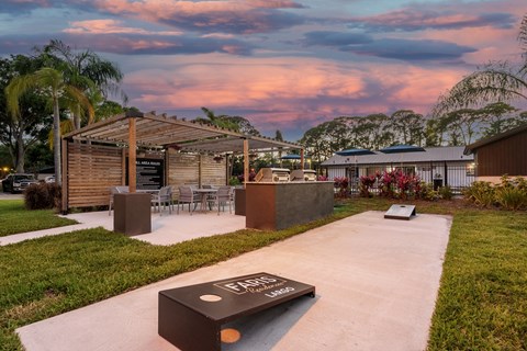 A modern building with a wooden structure and a sign that reads "BAR".
