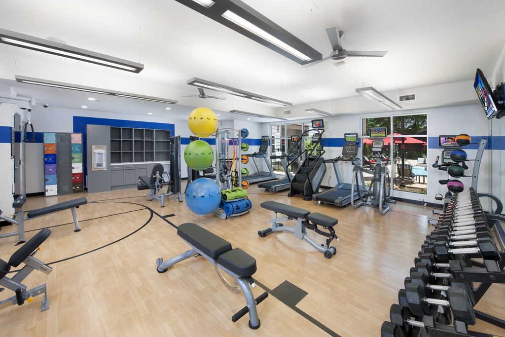a spacious gym with treadmills and other exercise equipment at Marley EAV, Atlanta, GA, 30316