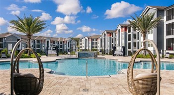 Poolside Sundeck With Relaxing Chairs Poolside Sundeck With Relaxing Chairs at Century Dunes, Deland - Photo Gallery 2