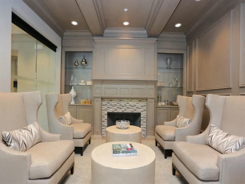 Clubroom with seating and fireplace 2370 Main at Sugarloaf Duluth, GA